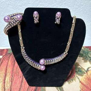 Earrings, necklace and bangle set.